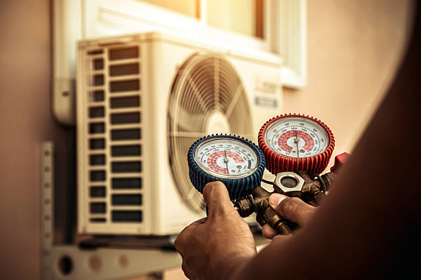 Professional Heat Pump Repair technician working in Commerce, CA